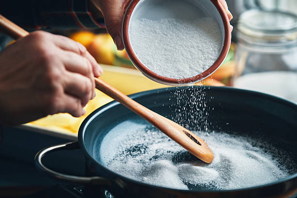 istock Preparing Tarte Tatin with Caramelized Apples in Domestic Kitchen 2216110623