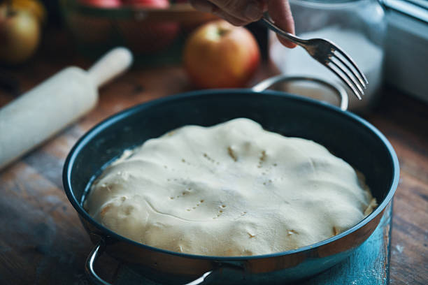 Preparing Tarte Tatin with Caramelized Apples in Domestic Kitchen
