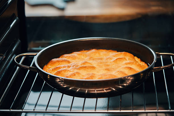 Preparing Tarte Tatin with Caramelized Apples in Domestic Kitchen