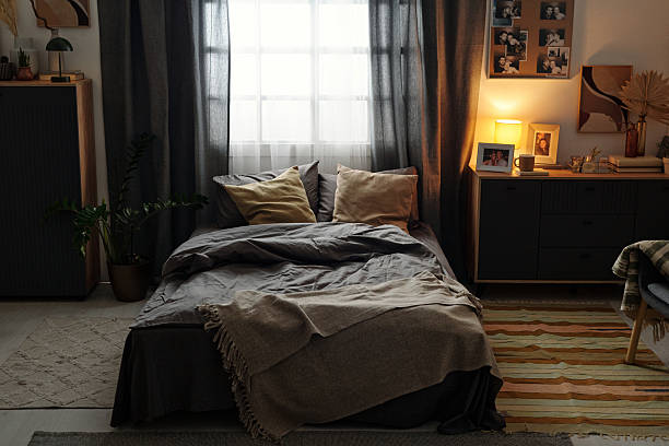istock Welcoming Cozy Bedroom with Soft Lighting and Decor 2216111339