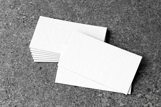 istock Business card on stone background. 2216114006