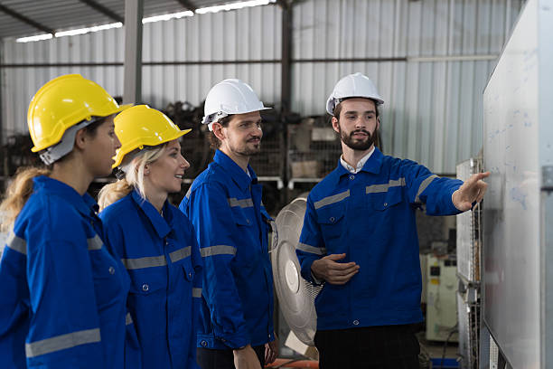 istock Engineer team, Group of colleagues or Workers meeting, discuss, training and present of work on whiteboard in factory 2216116765