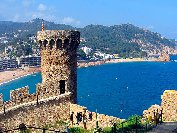 Fortress and Tossa beach at springtime . Tossa de Mar, Costa Brava, Girona province, Catalunya, Spain