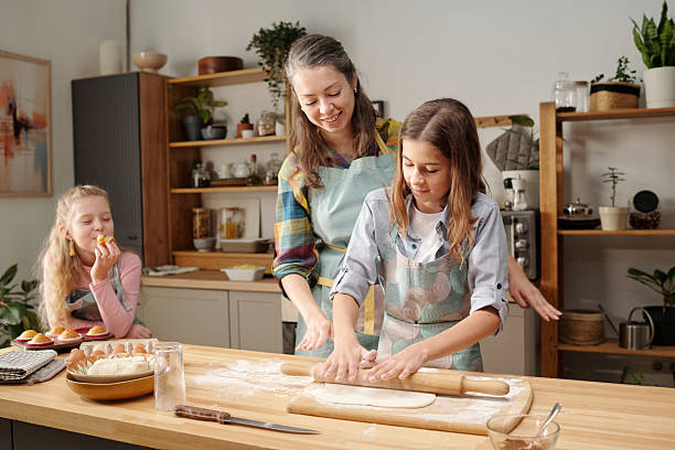 istock Baking Cookies With Family in Modern Kitchen 2216120832