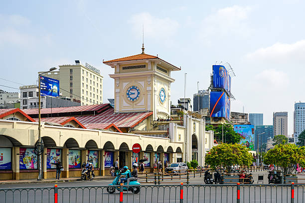 Ho Chi Minh City, Vietnam -March 16, 2025: Ben Thanh Market Clock Tower in Ho Chi Minh City, A Historic Landmark Amidst the Buzz of Vibrant Urban Life