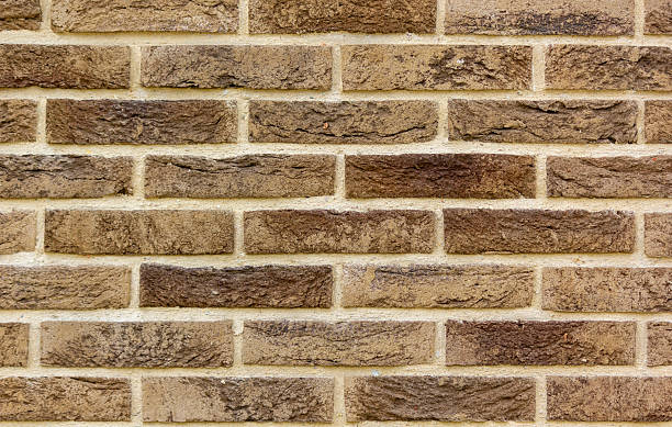 istock The texture of a brown lined wall . Beautiful fence 2216123451