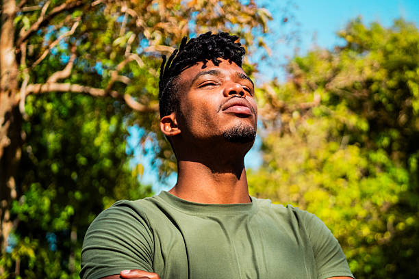 istock Young man contemplating at public park 2216125504
