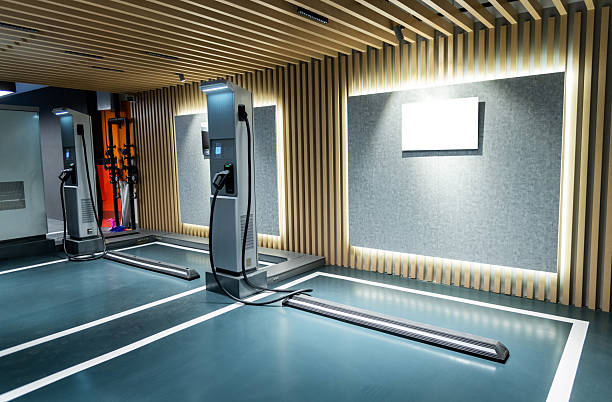istock Electric vehicle charging station in parking garage 2216128347