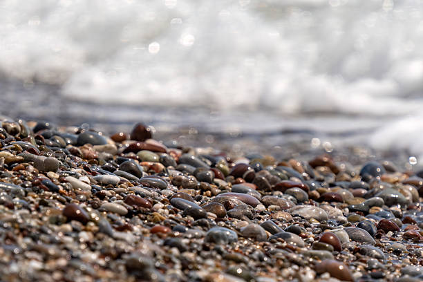 Wet pebbles by the sea
