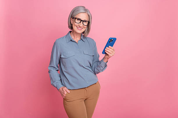 istock Photo of charming successful lady office agent boss writing answer send email modern device isolated on pink color background 2216135820