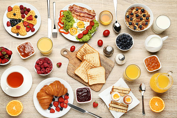 istock Tasty breakfast on wooden table 2216136254