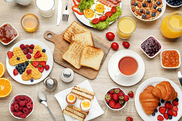 istock Tasty breakfast on wooden table 2216136524