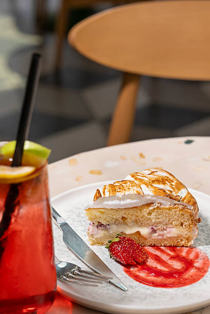 istock A slice of cake served with cold tea in a restaurant 2216136691