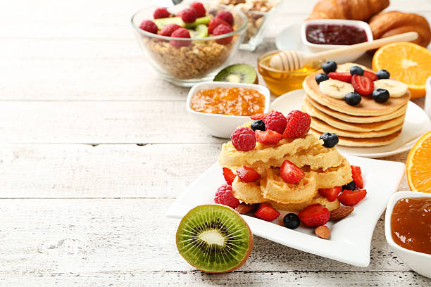 istock Fresh and tasty breakfast on kitchen wooden table 2216137206