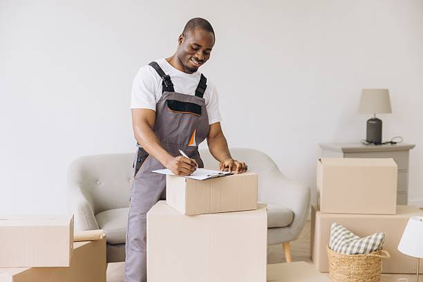 istock African American Mover Completing Inventory Checklist During Apartment Move 2216139471