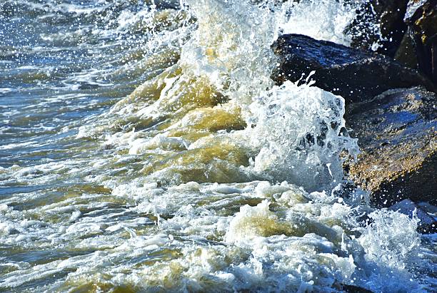 Windy day, high waves and surf, high tide on Chesapeake Bay in southern Maryland