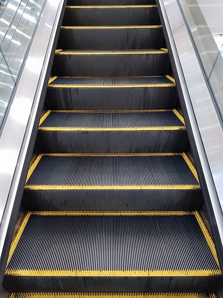 istock Close-up vertical image of an escalator inside a building. 2216146888