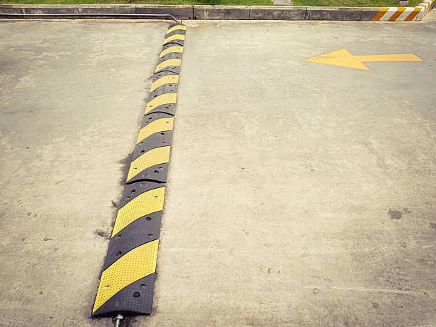 istock Traffic signs and speed bumps. 2216146963