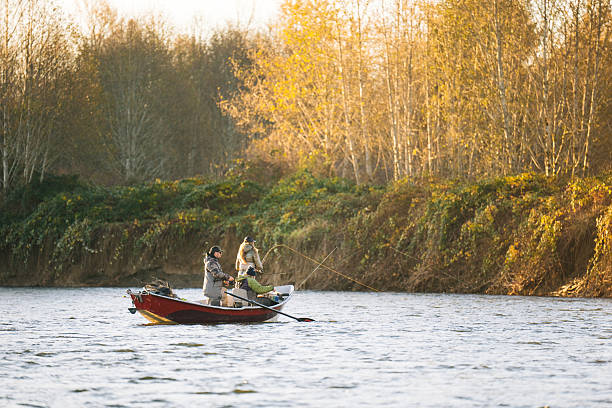 istock Young couple on guided drift fishing trip on river 2216149803