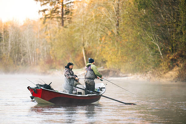 istock Young couple on guided drift fishing trip on river 2216149805