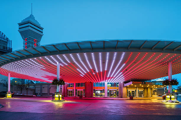 Casino Niagara in downtown Niagara Falls, Ontario, Canada illuminated at night.