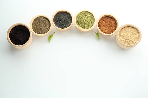 istock Different superfood powders in bowls on white background, flat lay. Space for text 2216152497