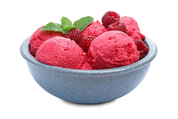istock Delicious raspberry sorbet, fresh berries and mint in bowl isolated on white 2216152619
