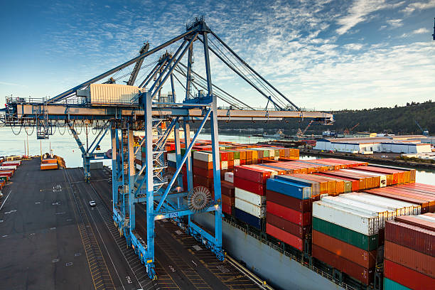 istock Gantry Crane next to Parked Cargo Ship on Blair Waterway in Container Terminal, Tacoma, Washington 2216153796
