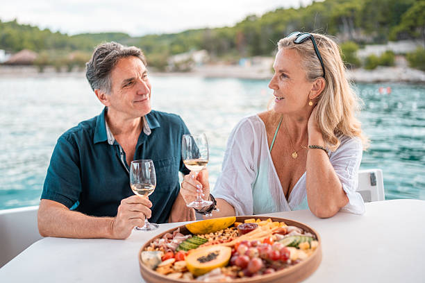 istock Mature Caucasian Couple Dining on Adriatic Boat 2216163334