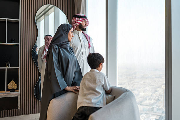 istock Diverse Arabic Family Enjoying Scenic Riyadh View from Modern Home 2216163398