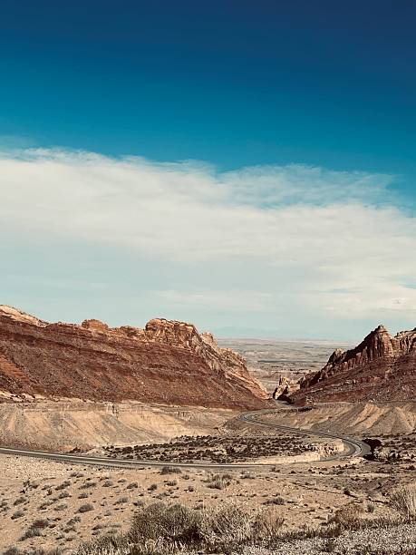 istock Winding Road Through Desert Landscape 2216163479