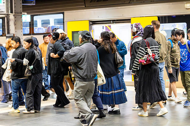 Sydney - Australia: May 18, 2025: Train arrived at the subway train station in Town Hall with people and commuters