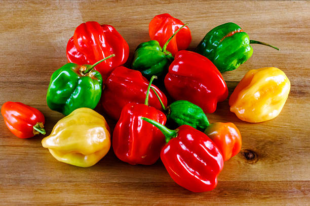 istock Habanero peppers on a wooden board 2216170049