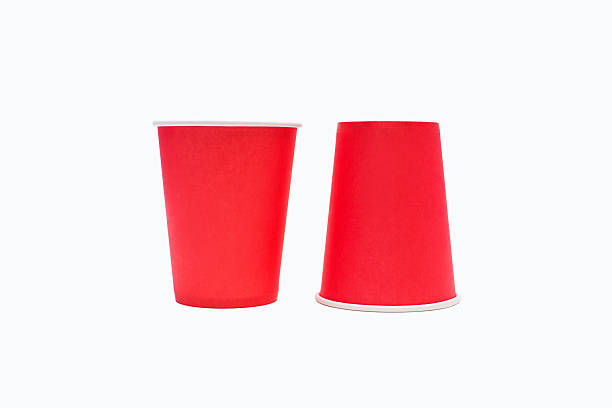 istock Disposable red cardboard coffee cups isolated on white background 2216174089