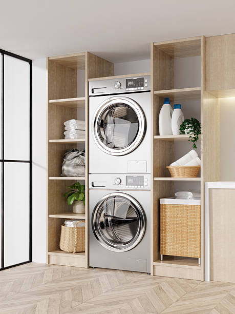 istock Laundry area design featuring stylish appliances and wooden storage. 3D render illustration 2216174119