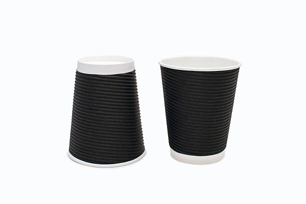 istock Disposable black cardboard coffee cups isolated on white background 2216174237