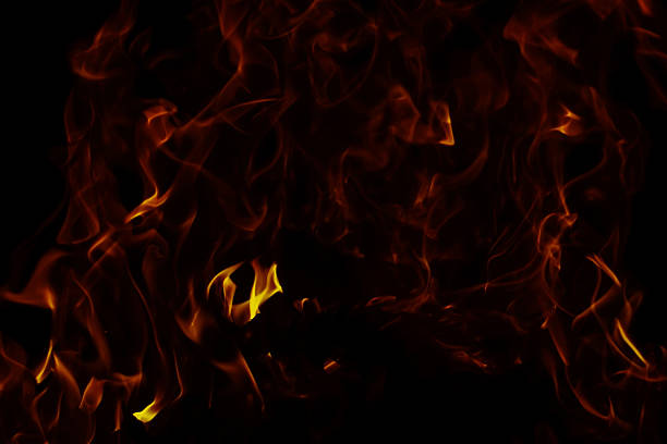 Burning flames against a dark background