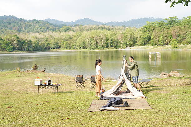 Picturesque view of mountain from tent with camping equipment