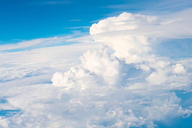 Sky clouds background. Blue Heaven and white clouds. White cloudy Heaven with soft sun light. Clouds on pastel blue sky background. Sky Landscape Background. Sky Clouds Wallpaper.