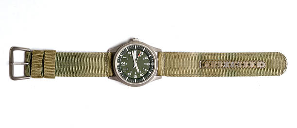 istock Top view military wrist watch with green nylon strap on white background. 2216189593