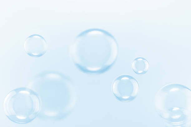 istock Beautiful Soap Bubbles Floating in The Air. Celebration Festive Backdrop. Freshness Soap Suds Bubbles Water. Blue and White Gradient Textured. Abstract Blurred Background. 2216189627