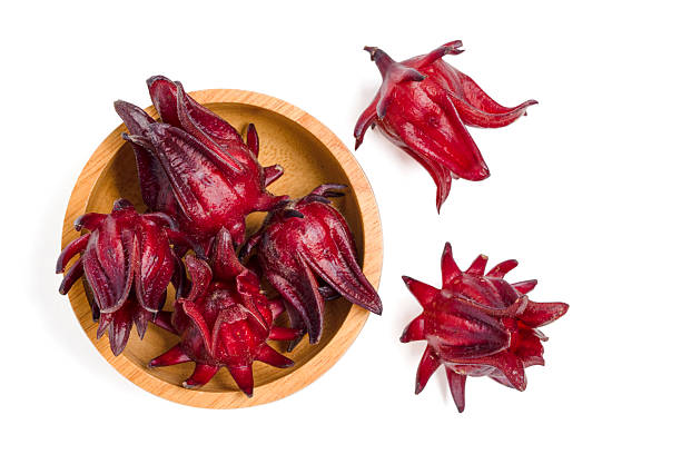 istock Top view fresh roselle fruit in wood bowl on white background. 2216189666