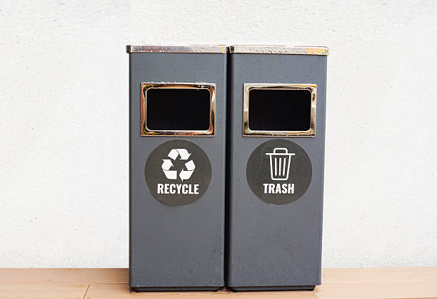 istock Two gray trash cans with general waste and recycling. 2216189945