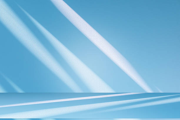 istock Studio style background wall decoration presentation uses white and blue tones. with shadows cast from a nearby window, concept creating a decorative 2216191988