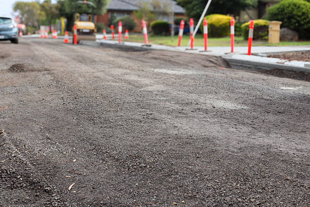 istock residential road with resurfacing underway in construction site 2216193359
