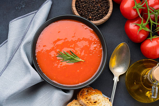 istock Homemade tomato soup on vintage black  table 2216195964