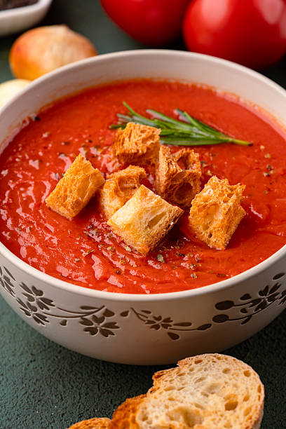 istock Homemade tomato soup on vintage table 2216196538