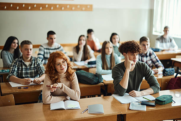 istock Group of students on a class at high school. 2216199893