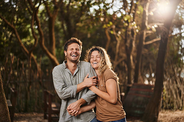 istock Young cheerful couple having fun in summer day. 2216201633