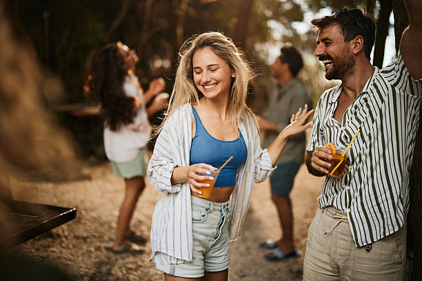 istock Cheerful couple dancing during spring party in nature. 2216201927